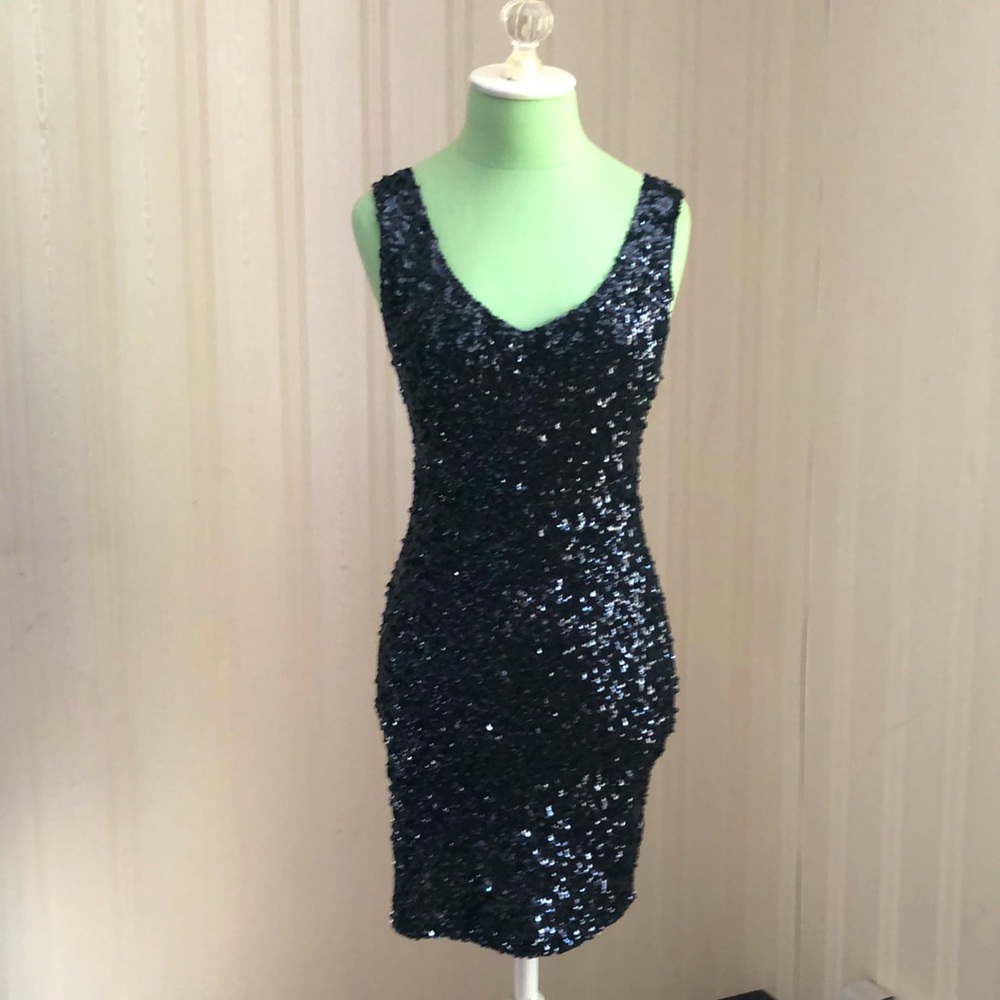 New with tags Sequin black mini dress